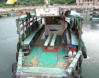 Wooden sampan ride
